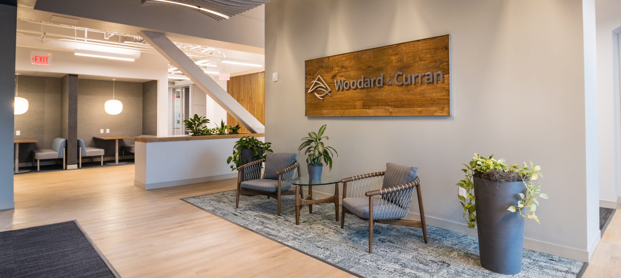 Office building interior with chairs and plants